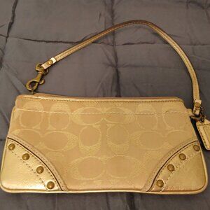 Coach Wristlet in Gold Signature trimmed with Gold Leather and Studs